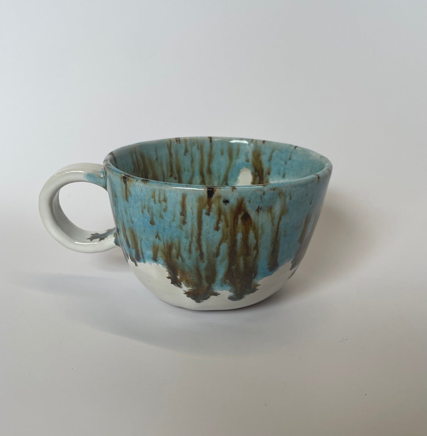 Blue speckled cappuccino cup