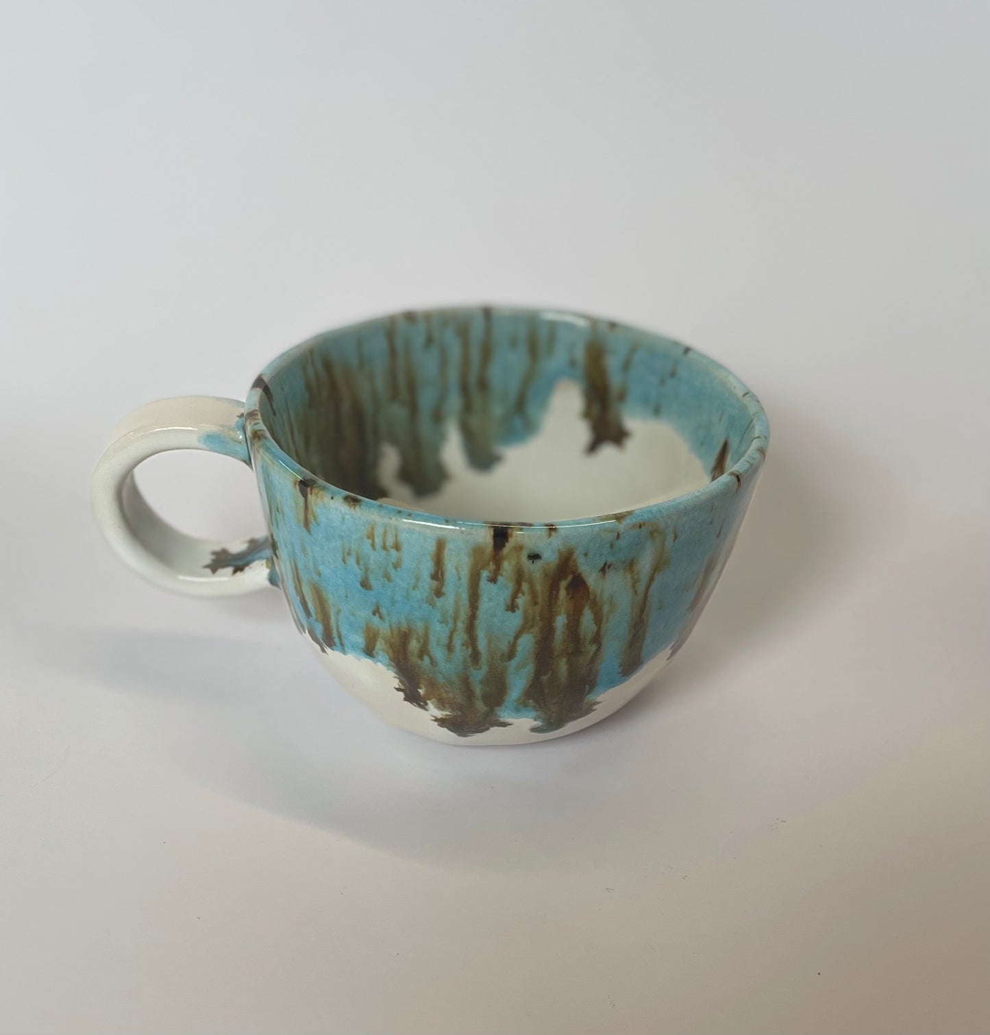 Blue speckled cappuccino cup