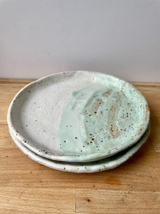 White and green speckled side plates