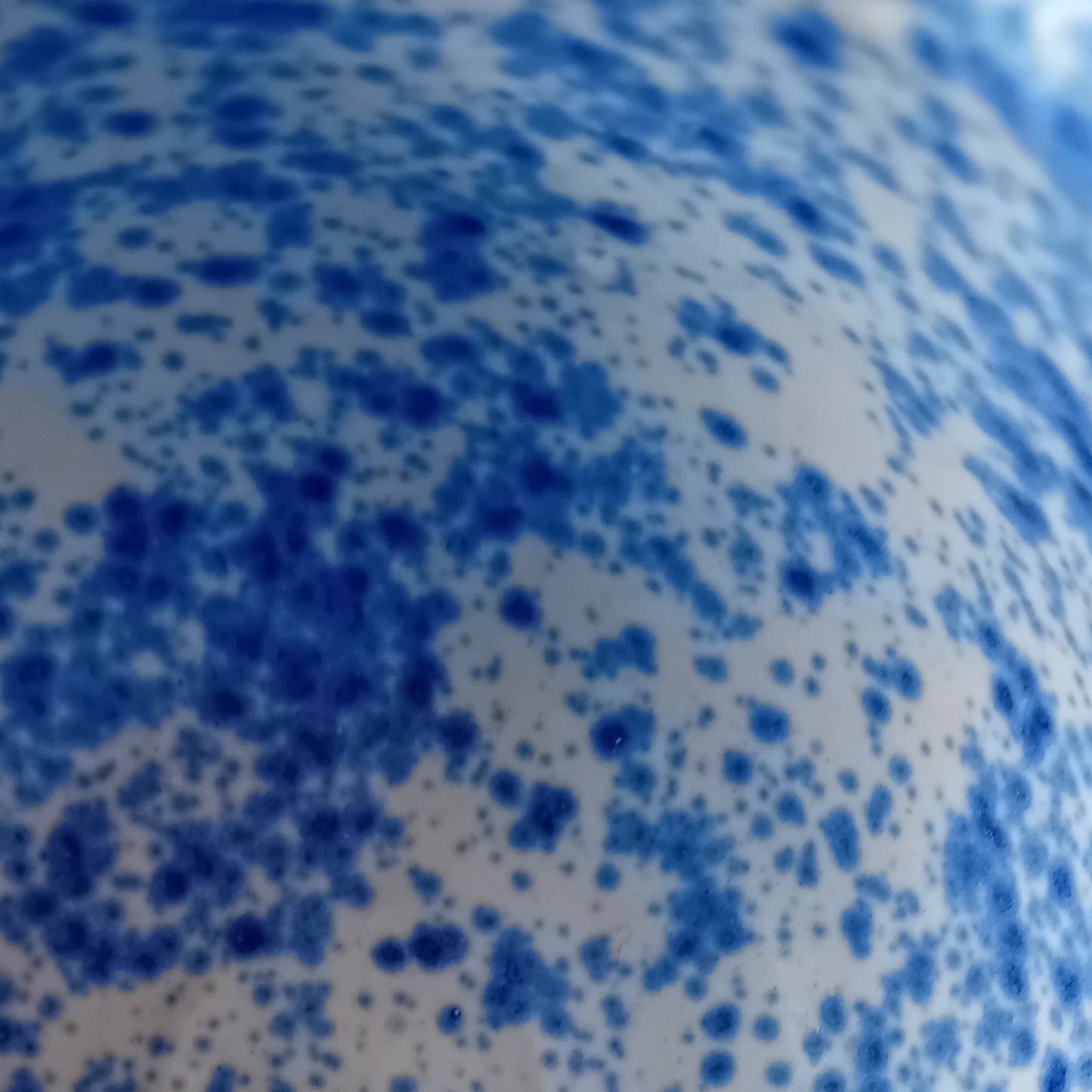 Handthrown tumbler with white and blue speckle glaze