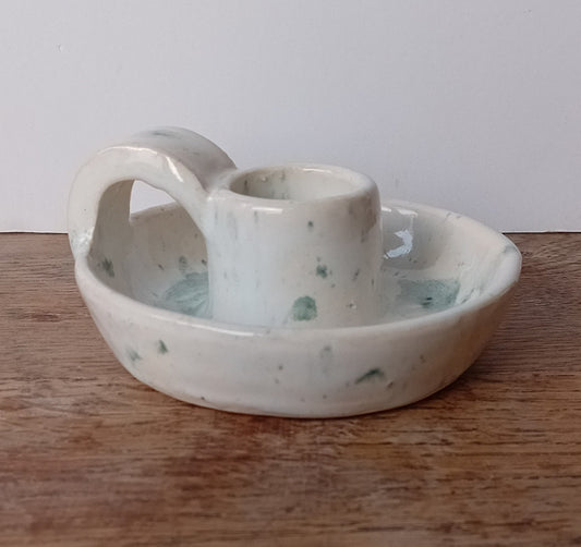 Candlestick with green and white splatter glaze
