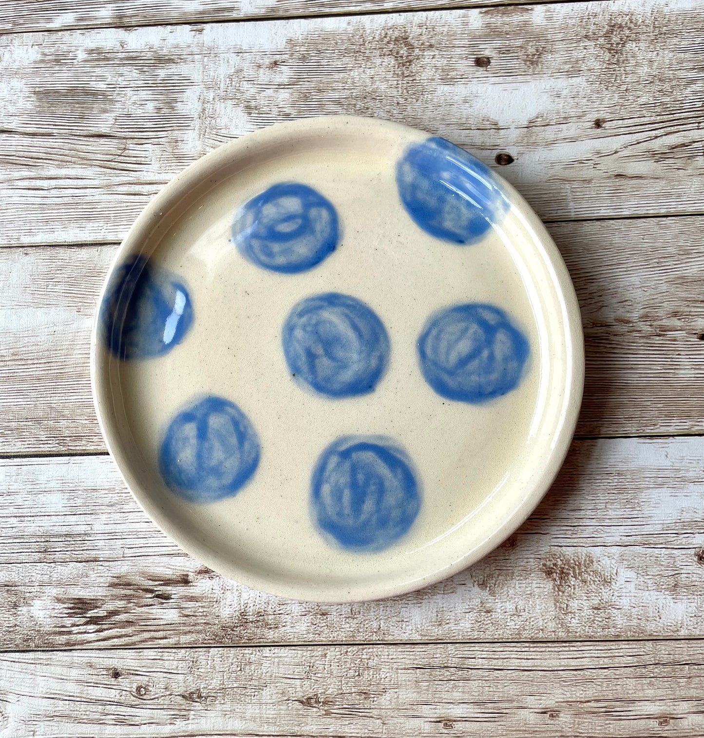 Small light blue spotty plate