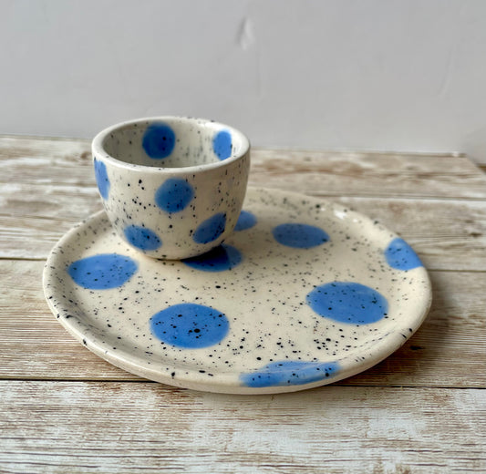 Egg cup and saucer with light blue spots