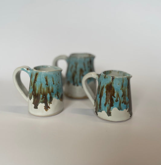 Blue jug with brown speckles